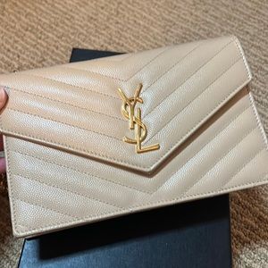 YSL WOC!!! Excellent condition and barely used! Comes with dust bag and box!